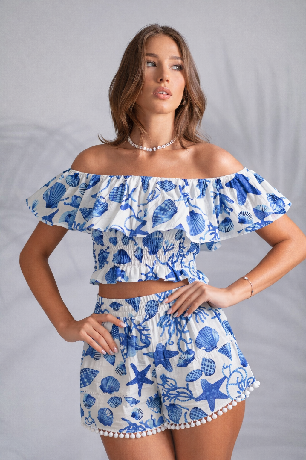 Coral linen mini shorts and ruffled top set