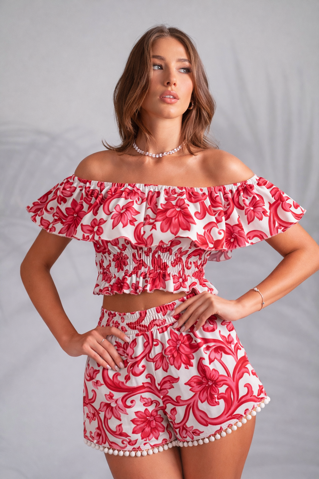 Linen two-piece set with pink paint print, ruffled top and mini shorts